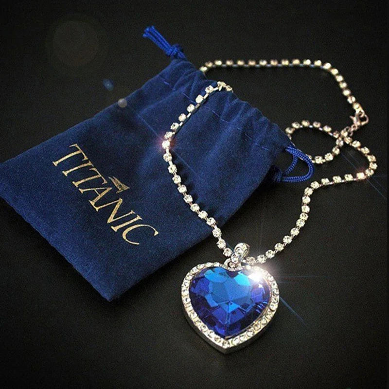 Titanic Heart of Ocean blue pendant necklace by FLIPSTYLEZLLC with velvet gift bag, featuring a heart-shaped love design.