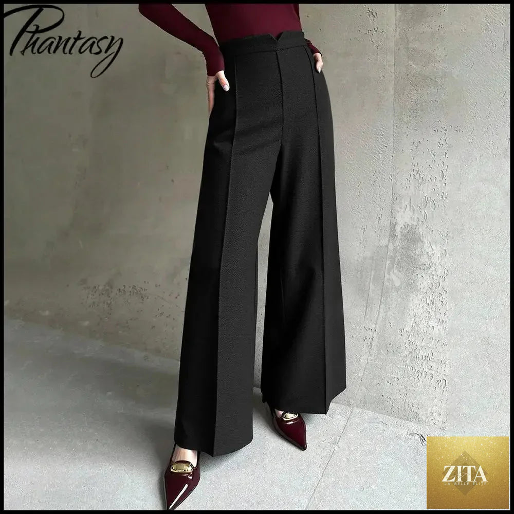 Black high-waisted suit pants for women by Ladyez, slim-fit, straight-leg, versatile workwear for spring and autumn.