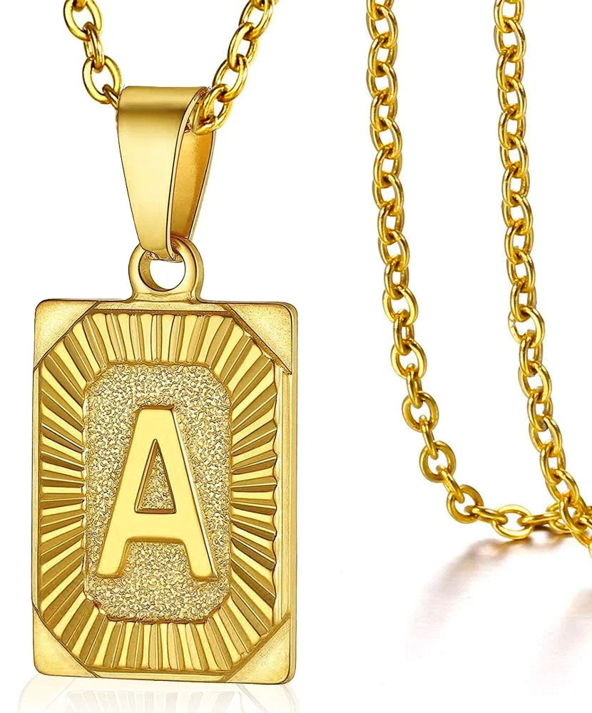 Simple stainless steel initial pendant necklace for women and men, featuring a cube link chain and letter charm, ideal for couples.
