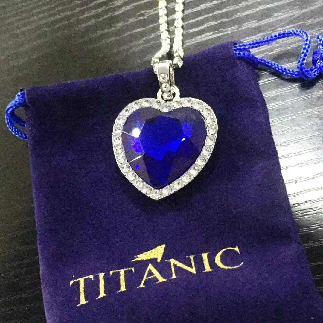 Blue Heart Love Forever Pendant Necklace by FLIPSTYLEZLLC with a velvet bag, featuring a Titanic Heart of Ocean design.