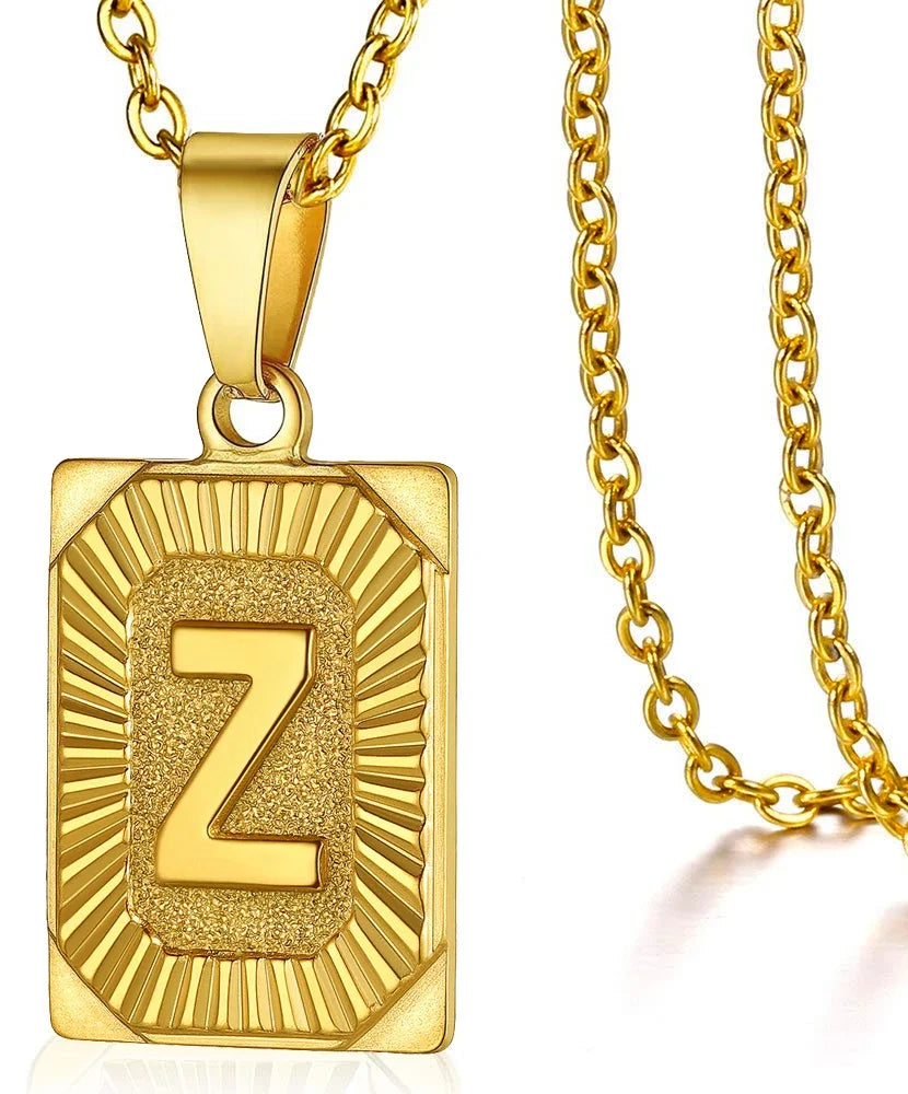 Simple stainless steel initial pendant necklace with cube link chain for women and men, ideal as couple jewelry or gift.