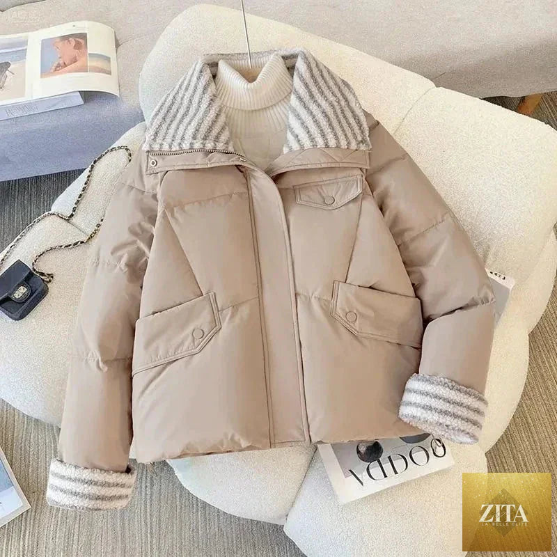 Women’s short cotton padded puffer parka with lapel collar, long sleeves, and warm lining, ideal for autumn and winter wear.