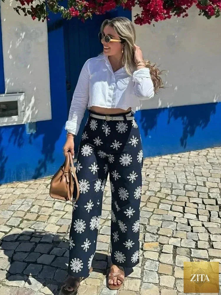 Ladyez women's navy blue cropped pants with floral embroidery, casual summer style, featuring a zip closure and relaxed fit.