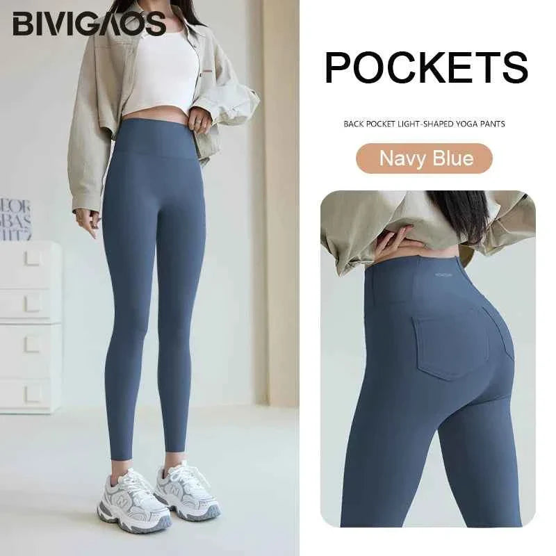 White women’s sharkskin leggings by THRIXINE, showcasing a sleek, fitted design with smooth, shiny fabric and comfortable stretch.