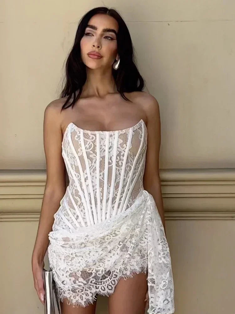 Black women's strapless lace corset mini dress with sleeveless design, lace-up detail, and fitted bodycon style for elegant parties.