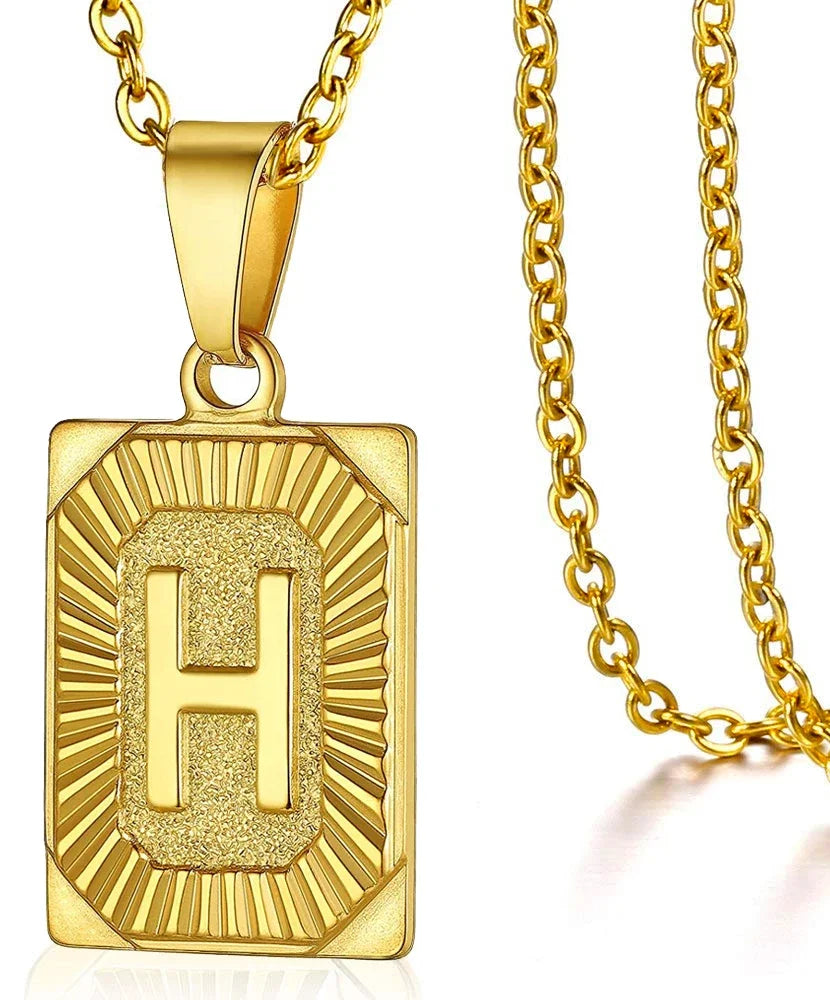 Simple stainless steel initial pendant necklace featuring a cube link chain and charm letter, ideal for women or couples.