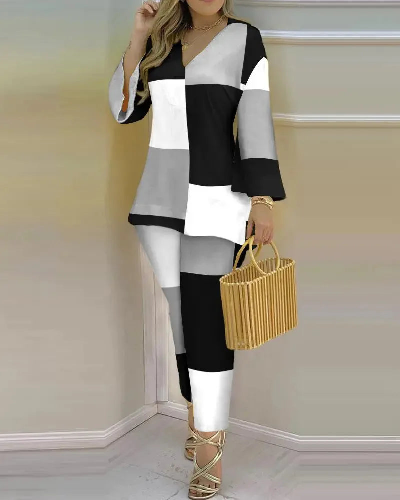 Women’s long sleeve V-neck two-piece set in printed polyester fabric, stylish and comfortable outfit by Trendy Attic Store01.