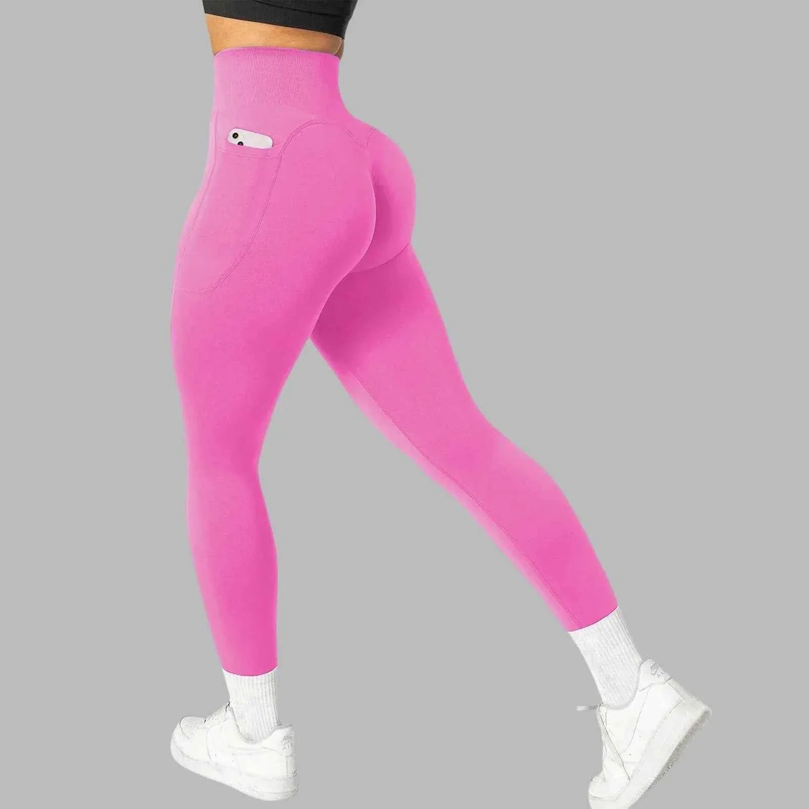 Women's seamless pocket yoga leggings by THRIXINE featuring a high waistband and form-fitting design for comfortable movement.