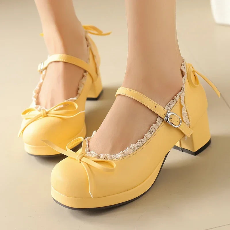 Women's Lolita cosplay Mary Jane pumps with strap, platform block heel, lace details, and bow, available in plus size.
