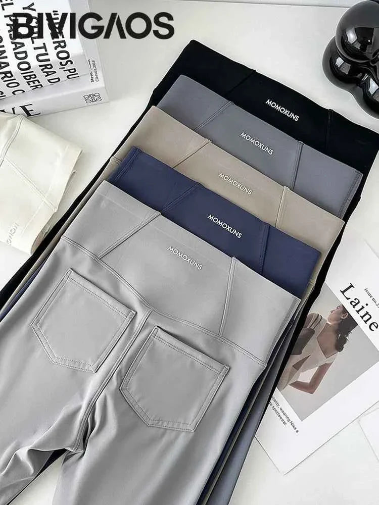 White Sharkskin leggings for women by THRIXINE, featuring sleek, smooth fabric and a comfortable fit.