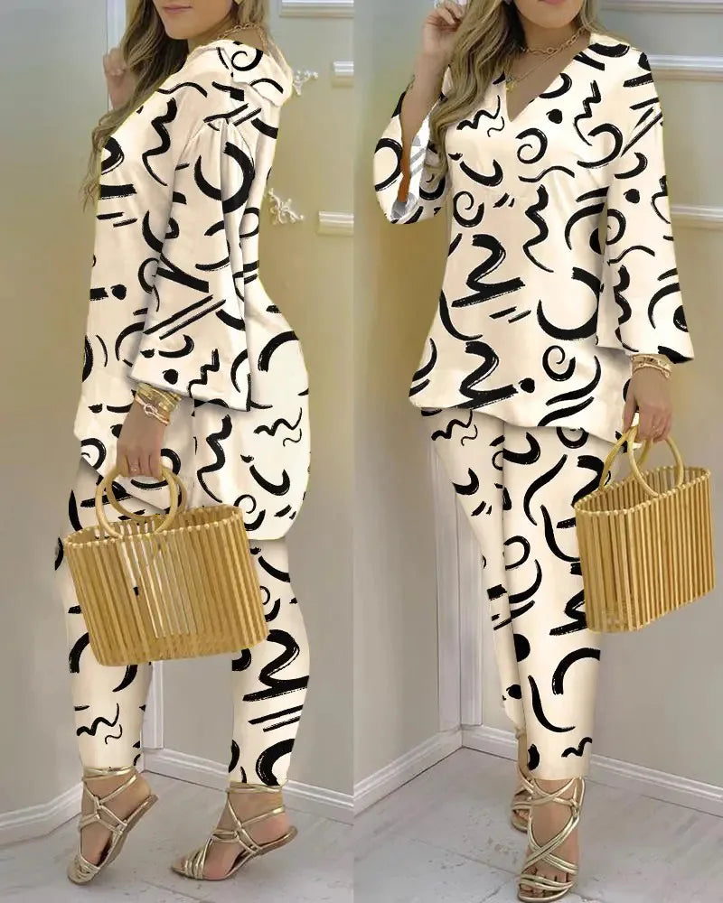 Women’s long sleeve V-neck polyester two-piece set with printed design, stylish and comfortable for casual wear.