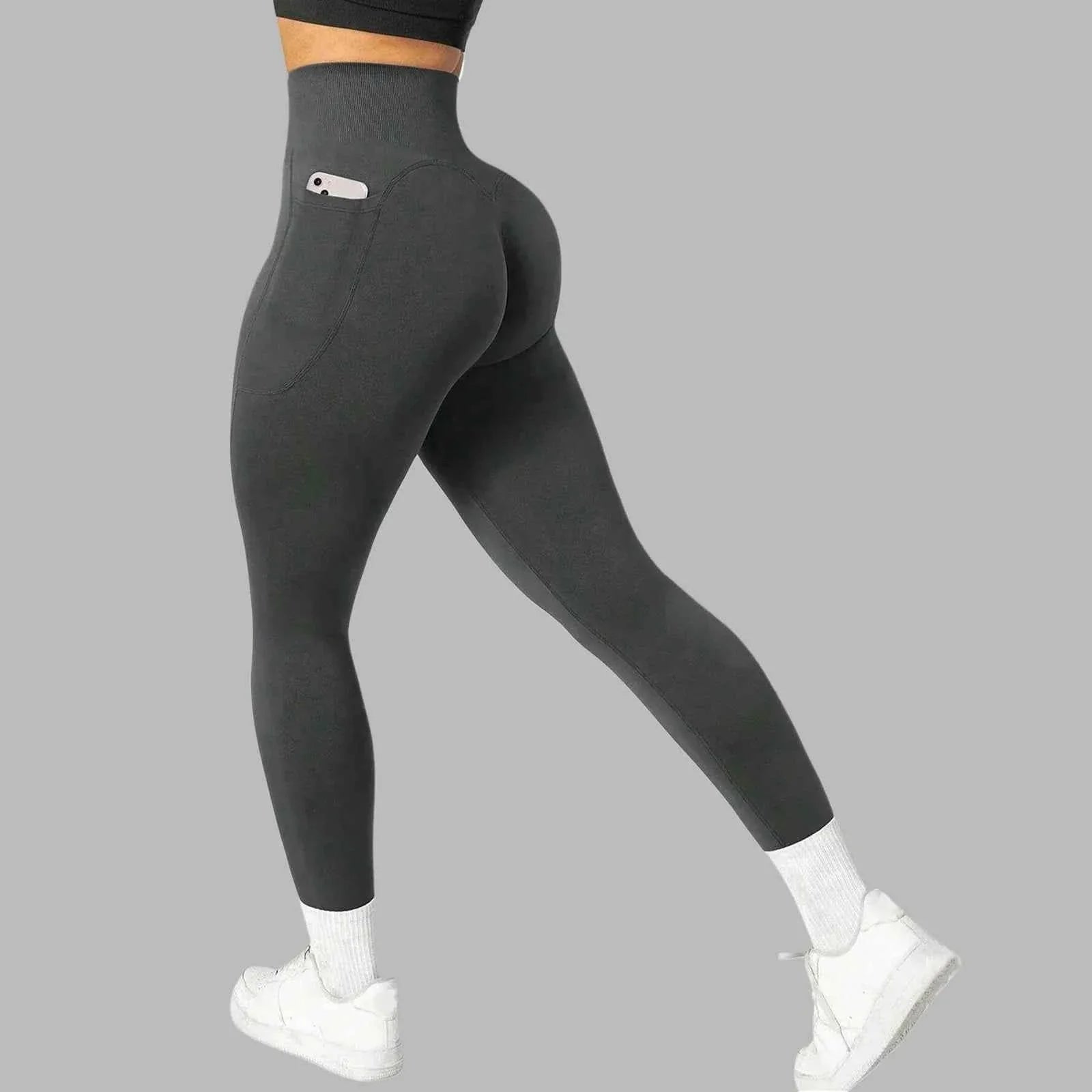Women's seamless pocket yoga leggings by THRIXINE featuring a comfortable fit with side pockets and stretchy fabric.
