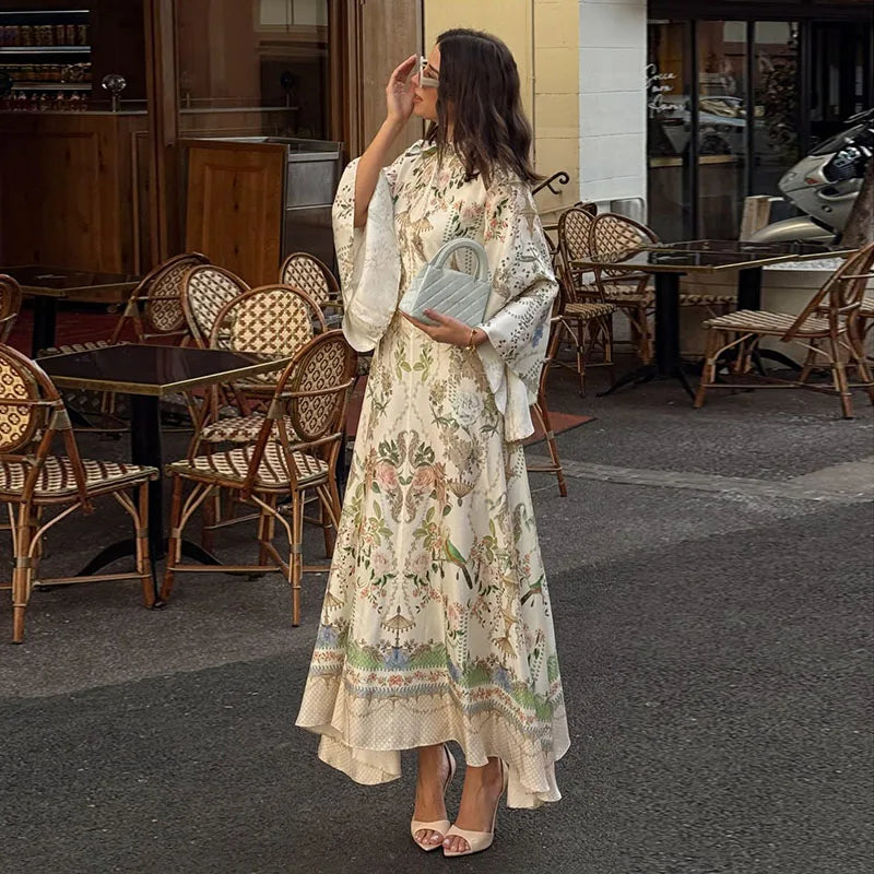 Floral print halter neck corset waist maxi dress with sleeveless design and flared hem, perfect for vacation or party occasions.