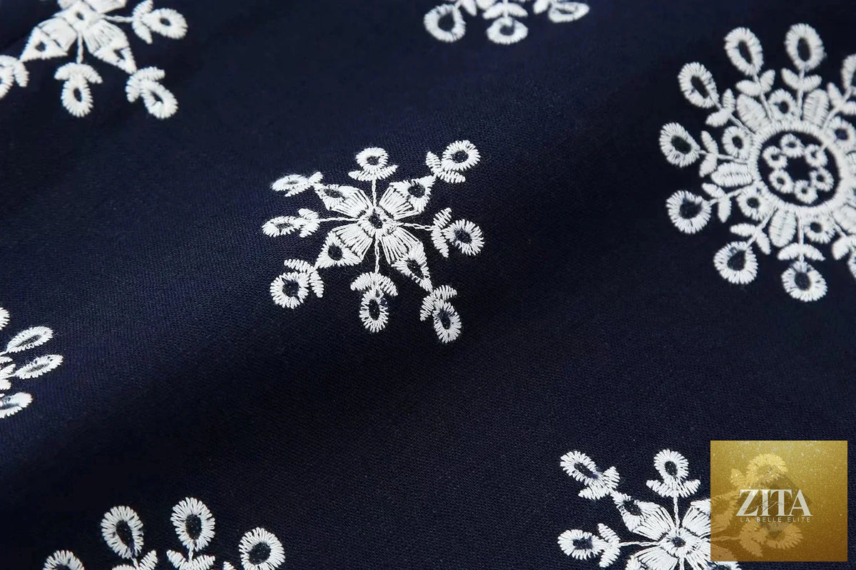 Ladyez women's navy blue floral embroidery cropped pants with casual style, summer fashion, zip detail, and comfortable fit.