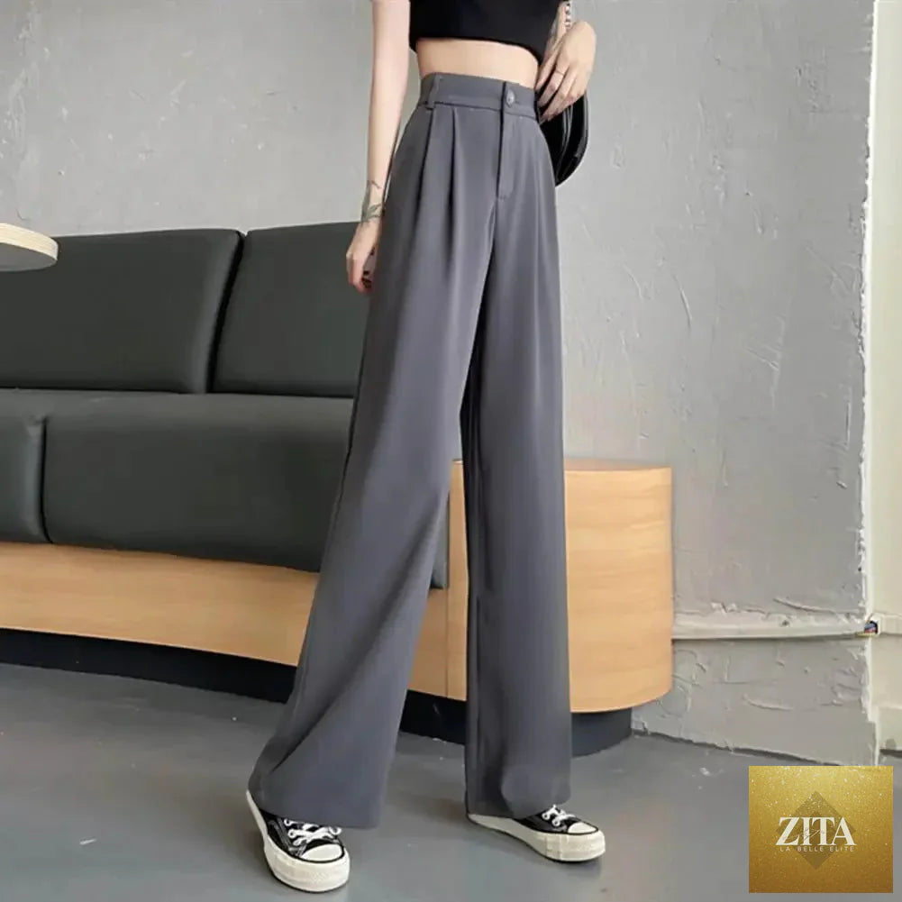 Women’s high waist wide-leg trousers by Ladyez, solid color office pants with elastic waistband and slant pockets.