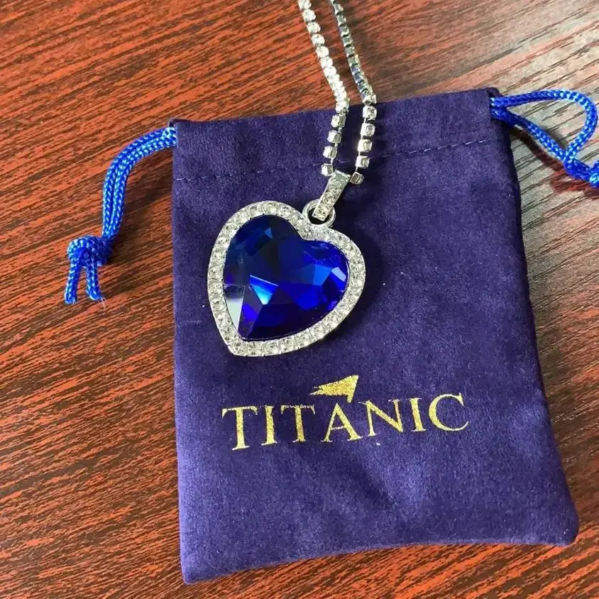 Titanic Heart of the Ocean blue pendant necklace by FLIPSTYLEZLLC with velvet gift bag, featuring a heart-shaped ocean-inspired design.