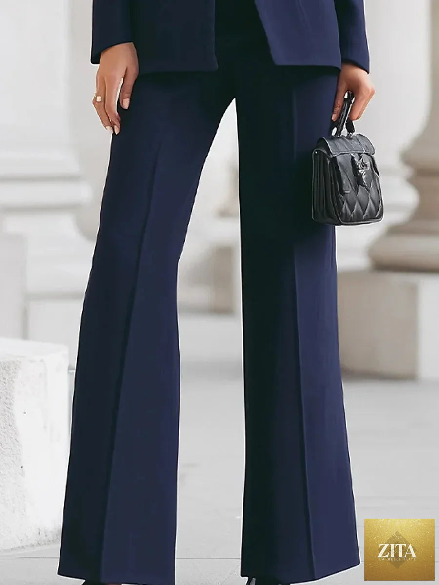 White women’s suit blazer and pants set by Nurse Nook Clothes, slim fit, single button, suitable for work, office, or casual wear.