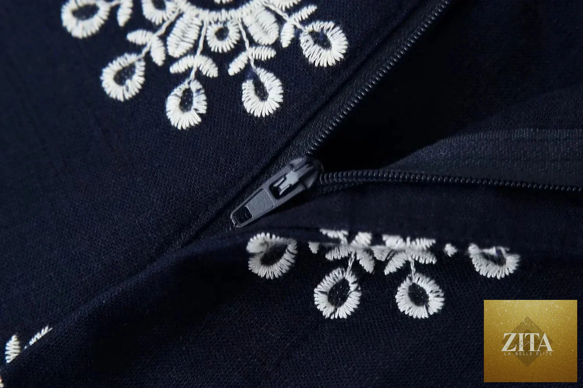 Navy blue women's cropped pants with floral embroidery and casual zip design from Ladyez, perfect for summer fashion.
