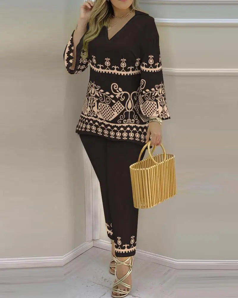 Women’s long sleeve V-neck two-piece set in printed polyester, stylish casual outfit from Trendy Attic Store01.