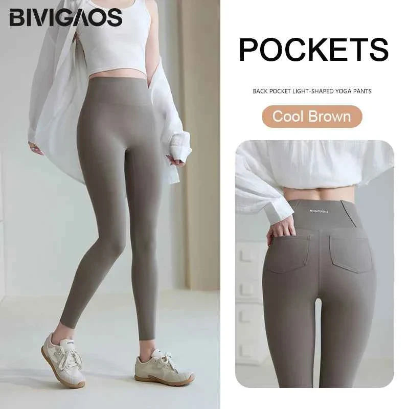 White Women's Sharkskin Leggings by THRIXINE featuring sleek, smooth fabric and a close-fitting design.