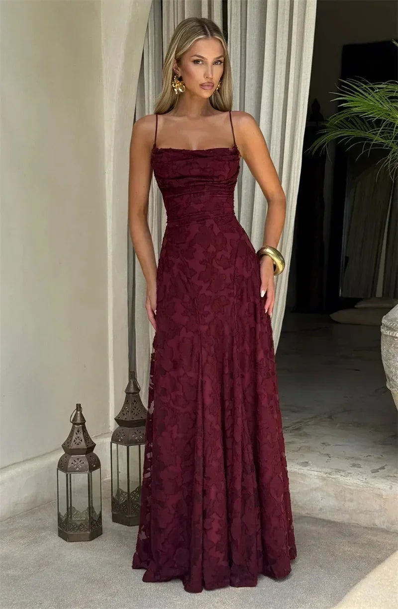Femstylo spaghetti strap backless maxi dress for women, featuring off-shoulder, sleeveless lace-up design, perfect for evening or party wear.