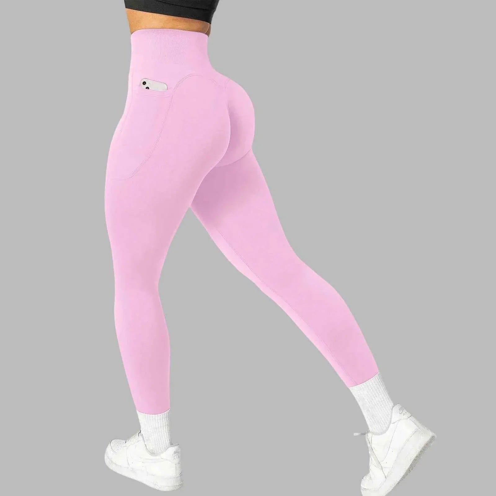 Women's seamless pocket yoga leggings by THRIXINE featuring a snug fit, flexible fabric, and side pockets for convenience.