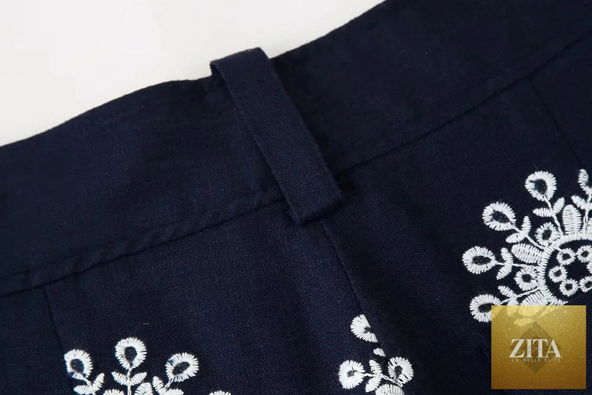 Ladyez floral embroidery cropped pants for women, navy blue summer casual pants with zipper and stylish floral details.