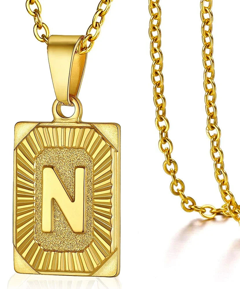 Simple stainless steel initial pendant necklace with Cuba link chain, perfect for women and men, ideal as a couple gift.