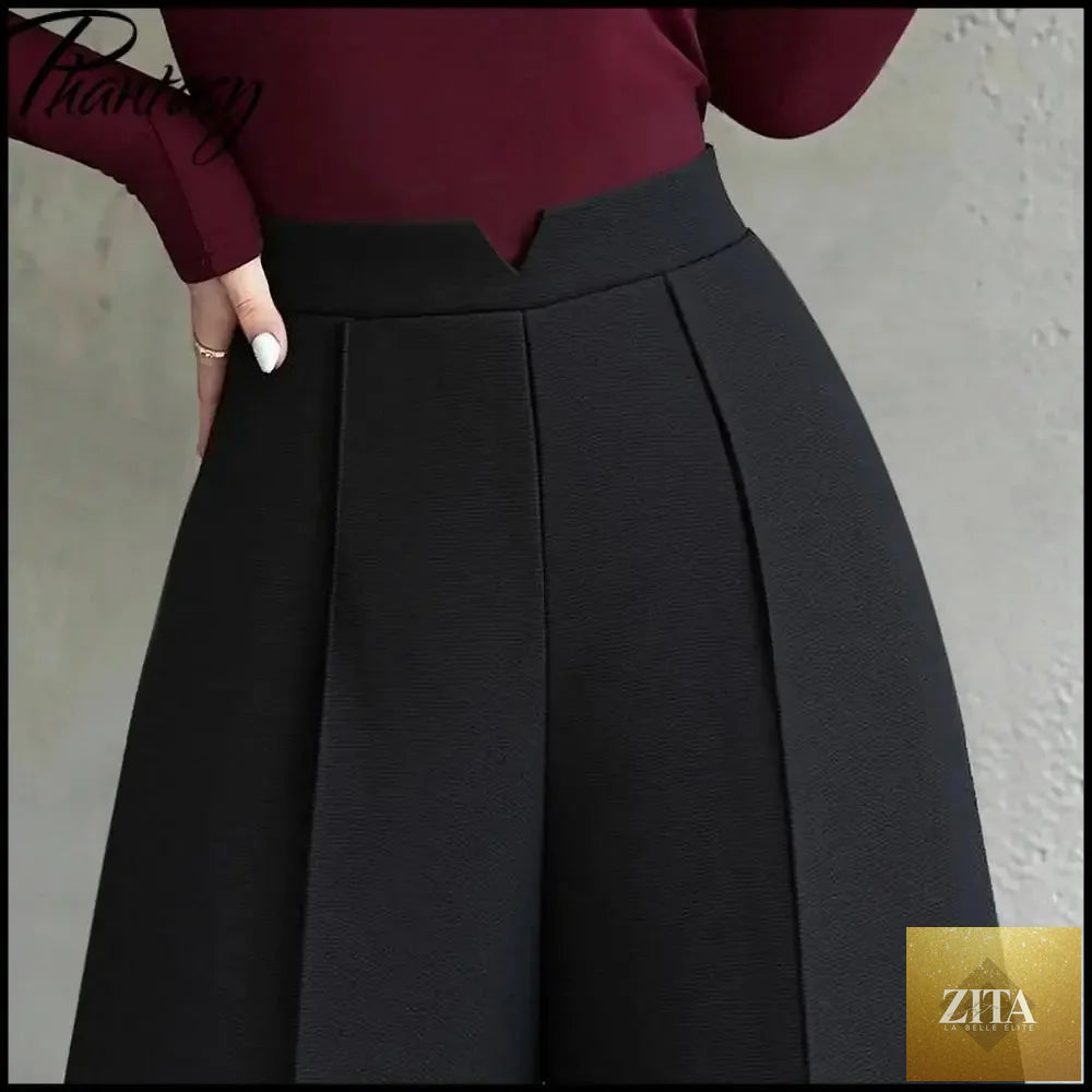 Black high-waisted suit pants for women by Ladyez, slim-fit, straight-leg, versatile workwear for spring and autumn.