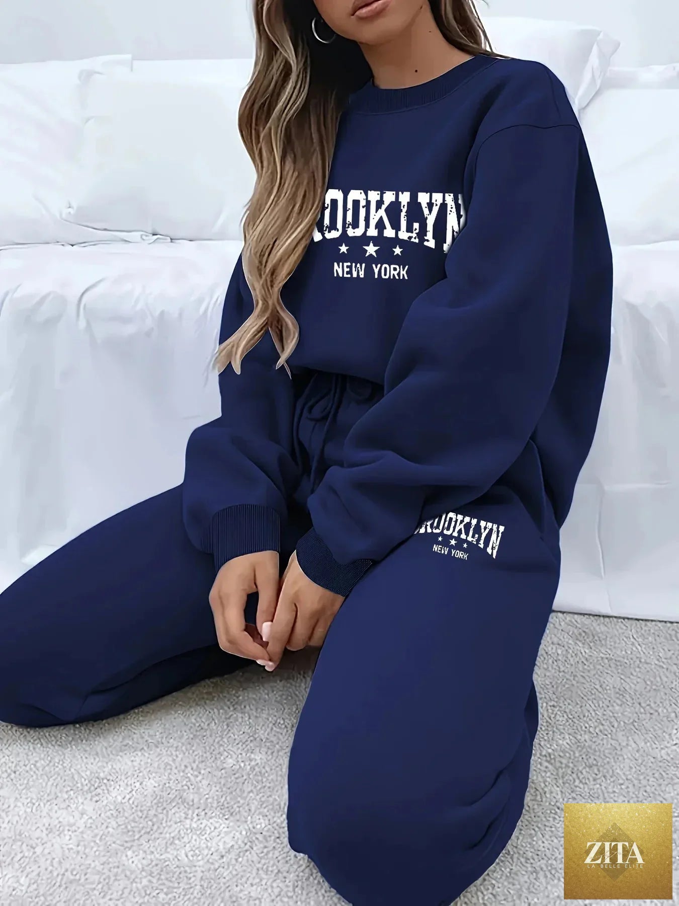 Women’s plush hoodie and pants sweater set by FitiqueFit, cozy winter tracksuit with soft, comfortable fabric for cold weather.