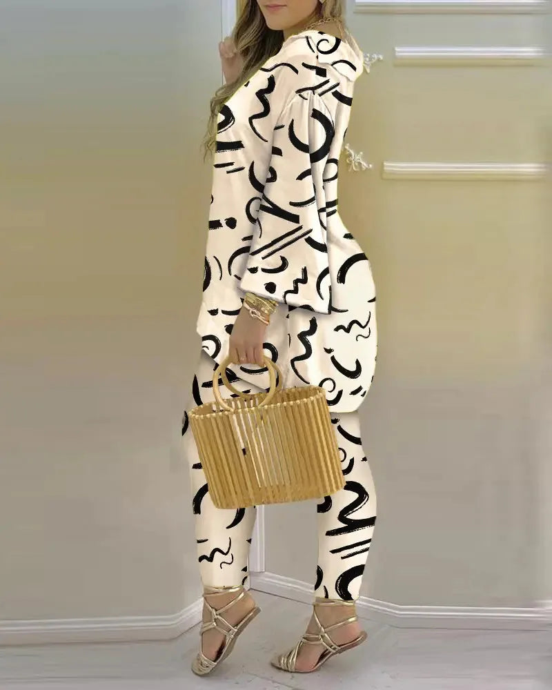 Women’s long sleeve V-neck polyester two-piece set featuring printed design, casual and stylish outfit by Trendy Attic Store01.