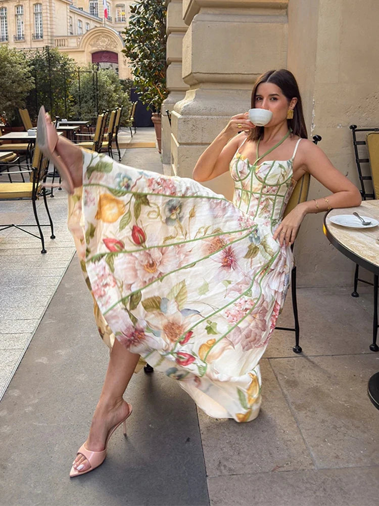 Floral print halter neck corset waist maxi dress by FLIPSTYLEZLLC featuring sleeveless design, flared hem, perfect for vacation or parties.