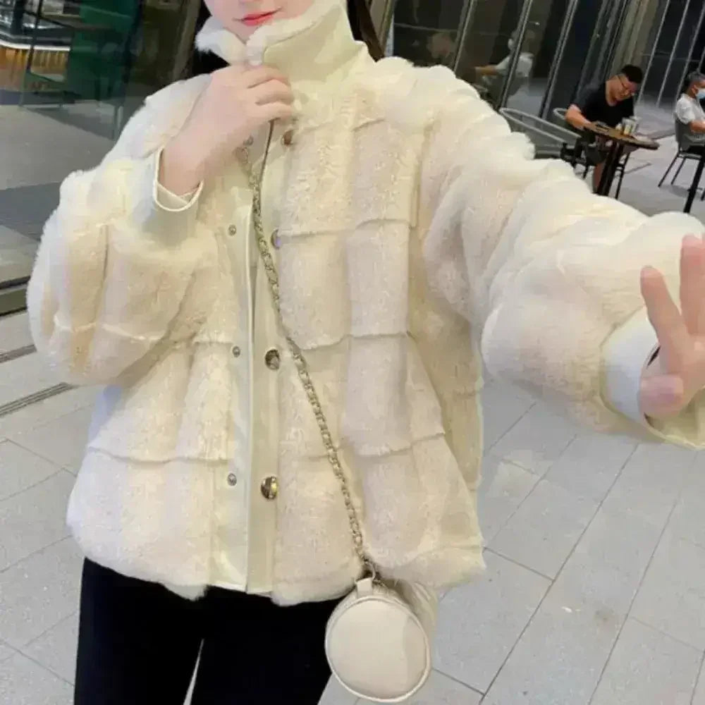 White faux fur jacket with vegan leather trimmed cuffs, available in sizes S to XXL, stylish outerwear by Femstylo.