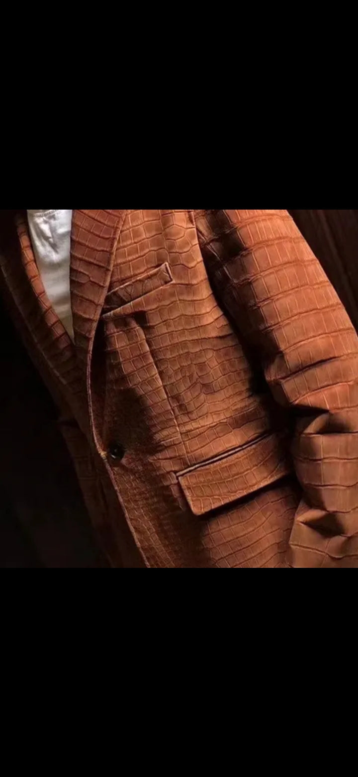 Handmade men's crocodile leather jacket by Don John, featuring detailed craftsmanship and a classic design.