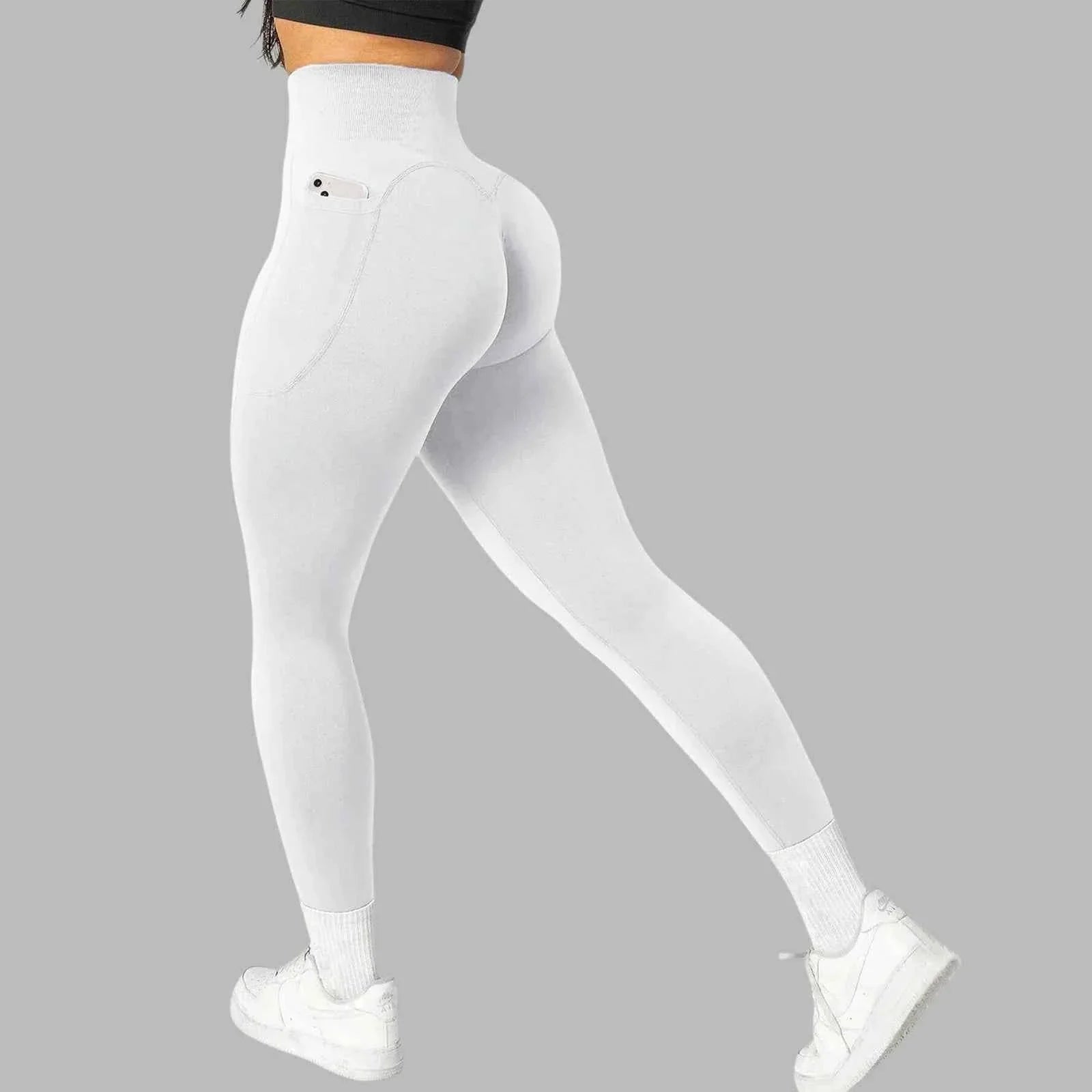Women's seamless pocket yoga leggings by THRIXINE, featuring a close-up of the soft, stretchy fabric with side pockets.