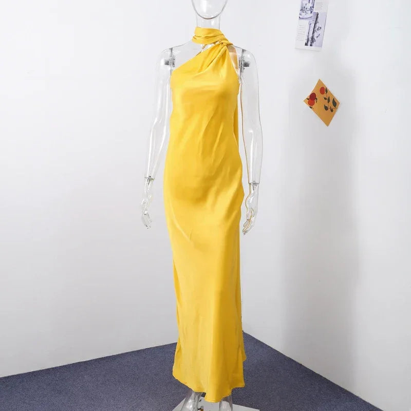Backless lace-up maxi dress by Femstylo, sleeveless evening gown with ribbon details, perfect for formal parties.