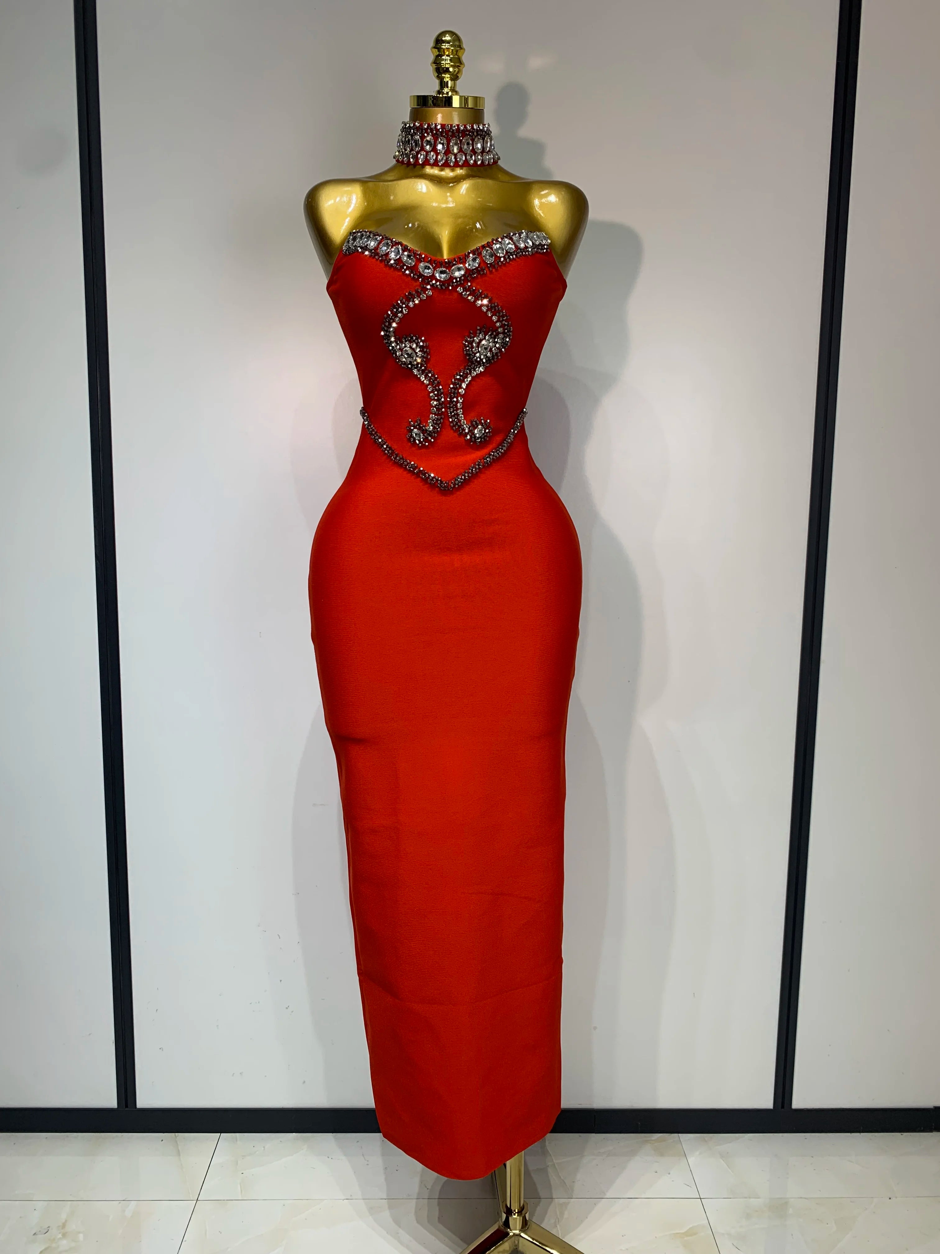 Elegant strapless beaded bandage dress by FLIPSTYLEZLLC, featuring a fitted silhouette, intricate beading, and a stylish neckline for evening parties.