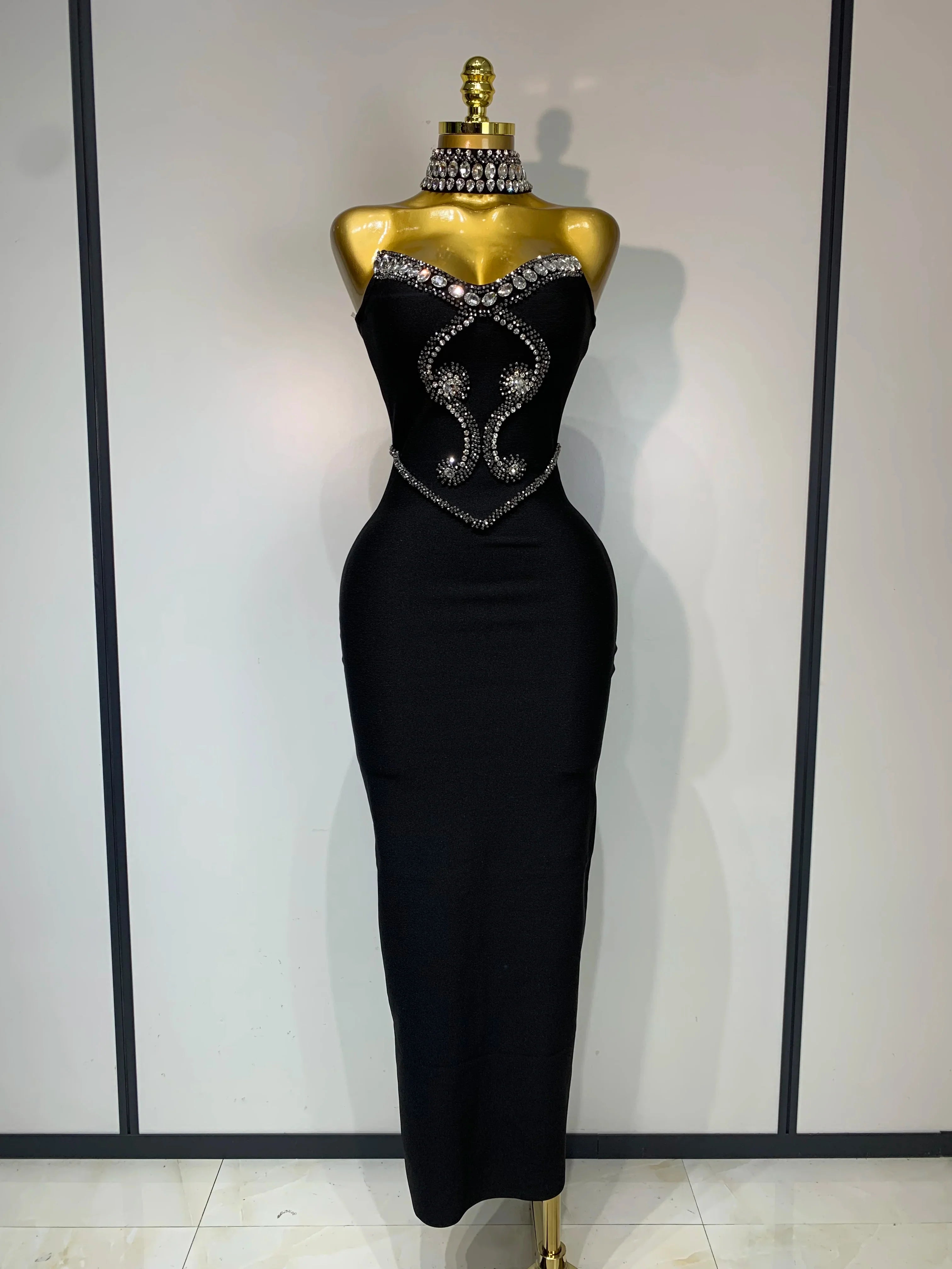 Elegant strapless beaded bandage dress by FLIPSTYLEZLLC, featuring a fitted design, suitable for evening parties and special occasions.