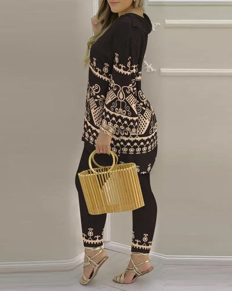 Women’s long sleeve V-neck two-piece set made of printed polyester fabric, stylish and comfortable for casual wear.