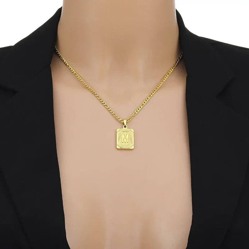 Simple stainless steel initial pendant necklace with cube link chain, featuring a letter charm, suitable for women or couples jewelry.