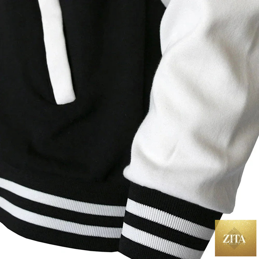 Women’s oversized solid color baseball jacket by FitiqueFit, displayed with front view and ribbed cuffs.