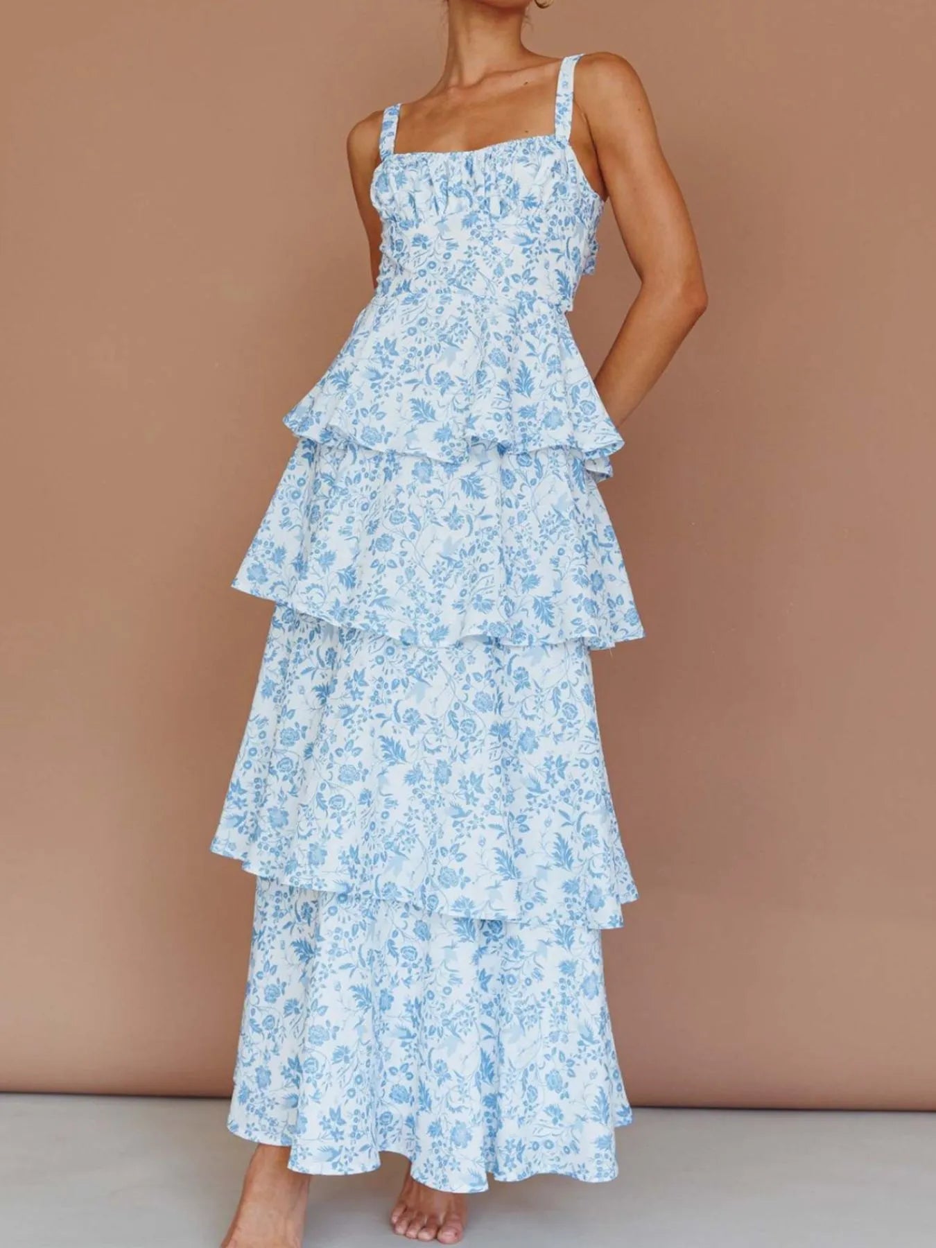 Floral layered ruffle maxi dress by Shopiebay featuring a flowing design and vibrant flower pattern, perfect for summer occasions.