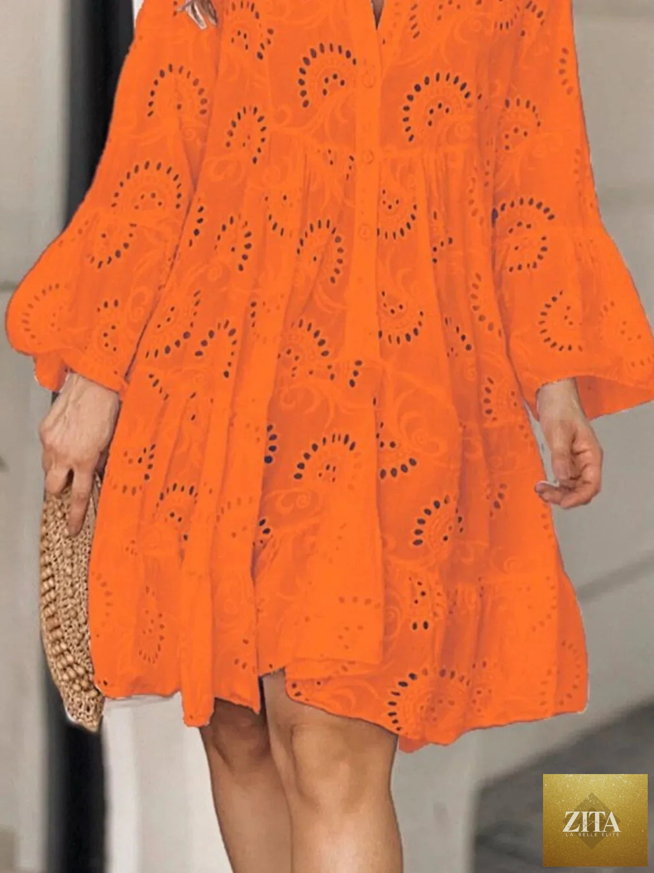 Eyelet ruffled hem tiered dress from Shopiebay showcasing a feminine, flowy design with layered tiers and delicate eyelet details.