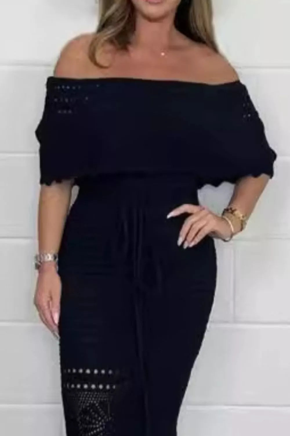 Crochet off-shoulder maxi dress from Shopiebay featuring intricate lace details and flowing silhouette, perfect for summer wear.