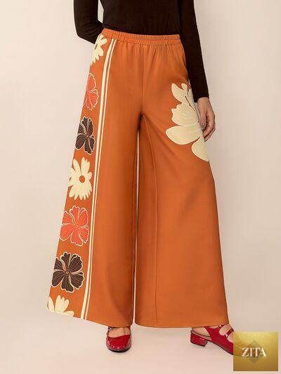 Selvanelle printed elastic waist wide-leg pants with a comfortable fit, featuring a stylish design and flowing fabric.