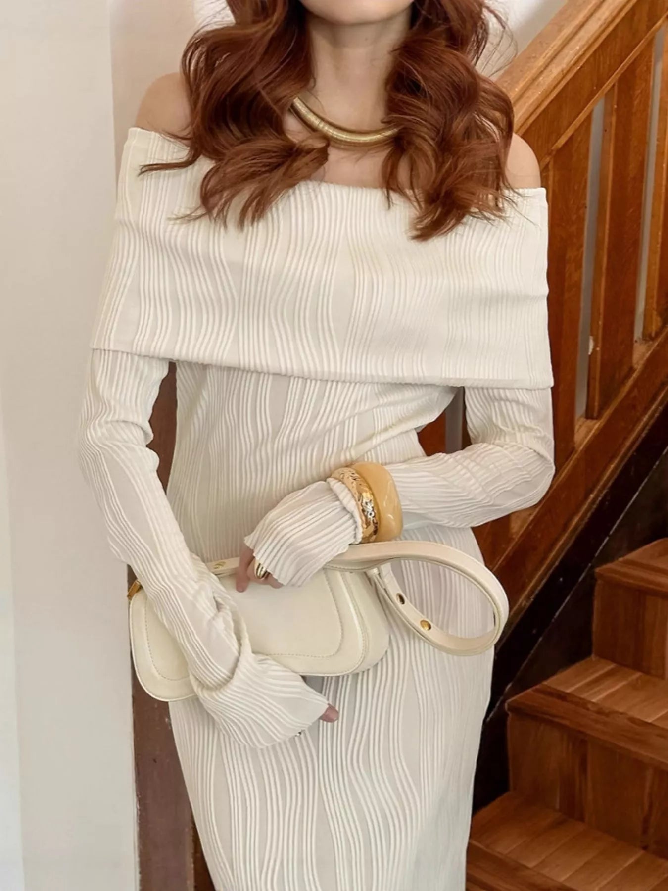 Off-shoulder textured knit maxi dress from Shopiebay, featuring a flowing silhouette and stylish design.