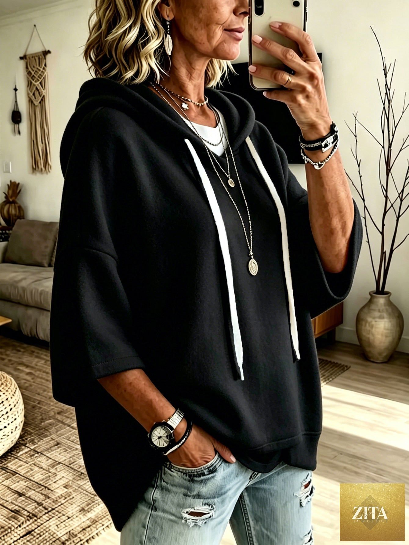 Women's oversized batwing sleeve hoodie by FitiqueFit, featuring a loose fleece pullover with relaxed fit and fashionable batwing design.