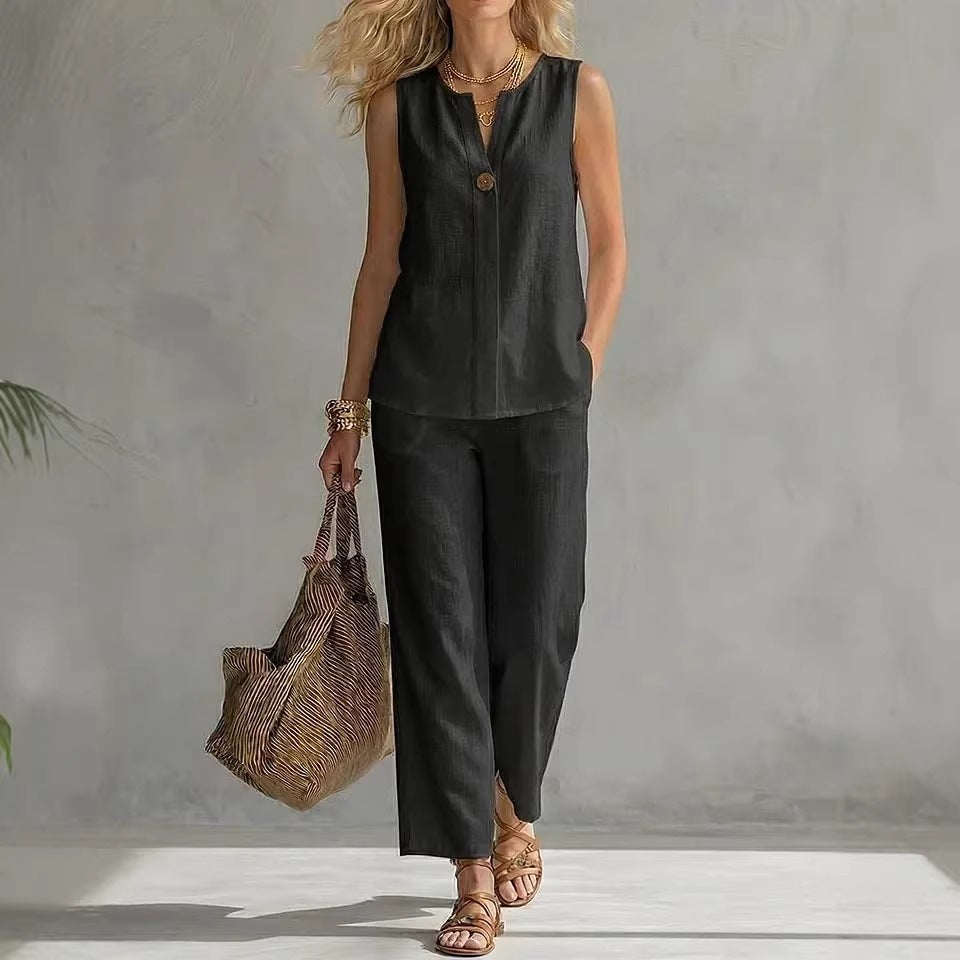 Women's sleeveless V-neck top and full-length pants two-piece casualwear set by FitiqueFit, shown in a relaxed fit on a model.