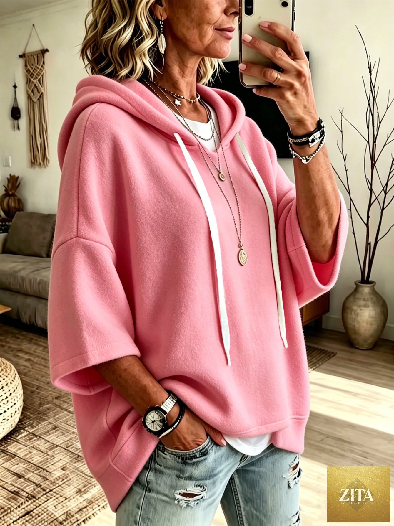 Women's oversized batwing sleeve hoodie by FitiqueFit, loose fleece pullover with relaxed fit and casual style.