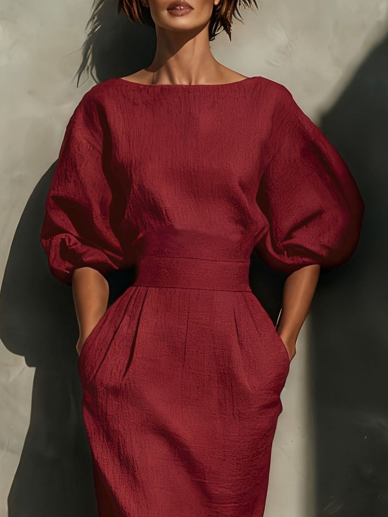 Round neck puff sleeves midi dress by Shopiebay featuring a fitted waist and flowy skirt in soft fabric.